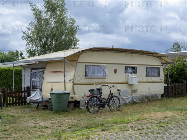 Caravan with air conditioning at a campsite on Lake Jersleben, Jersleben, Saxony-Anhalt, Germany,