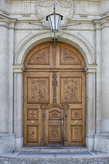 Artfully decorated wooden portal of the collegiate church, St. Gallen Cathedral, UNESCO World