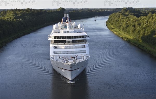 Cruise ship Europa 2 sailing in the evening light in the Kiel Canal, Kiel Canal,