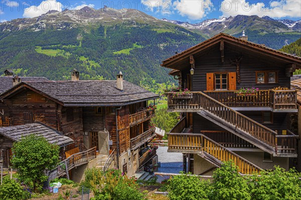 Old wooden houses with external staircases and balconies, historic village centre, Grimentz, Val
