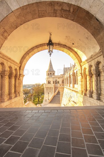 Old historic fortress and church at sunrise. City panorama at dusk. View of the Danube Fishermen's