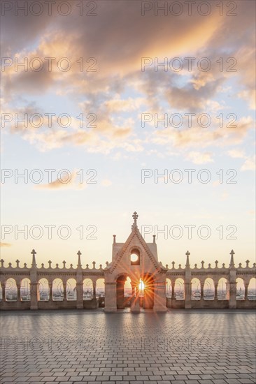 Old historic fortress and church at sunrise. City panorama at dusk. View of the Danube Fishermen's