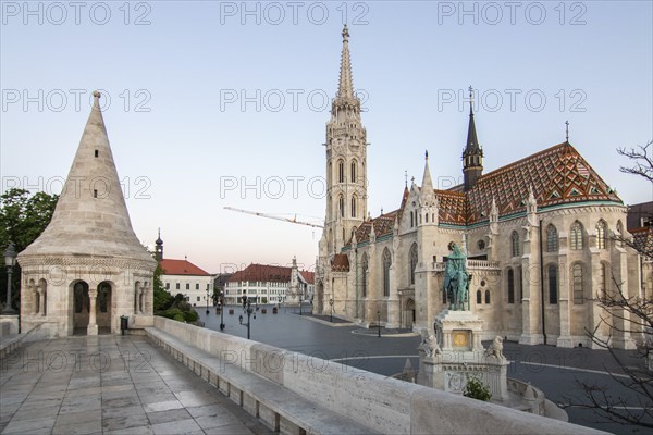 Old historic fortress and church at sunrise. City panorama at dusk. View of the Danube Fishermen's