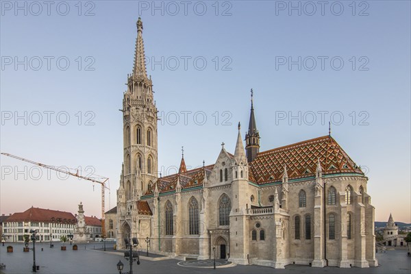 Old historic fortress and church at sunrise. City panorama at dusk. View of the Danube Fishermen's