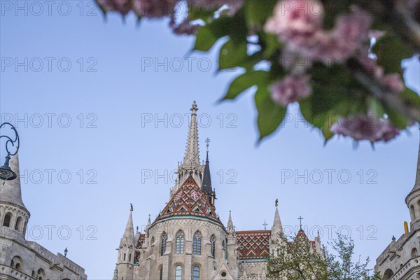 Old historic fortress and church at sunrise. City panorama at dusk. View of the Danube Fishermen's