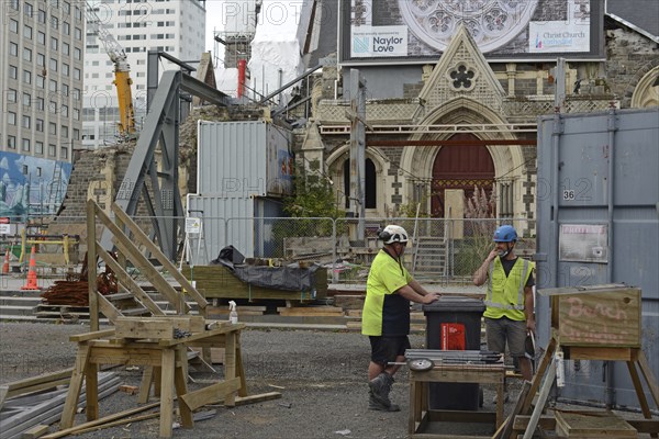 CHRISTCHURCH, NEW ZEALAND, FEBRUARY 24, 2022: A team of tradesmen work on the Anglican Cathedral