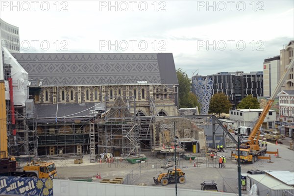 CHRISTCHURCH, NEW ZEALAND, FEBRUARY 24, 2022: An team of tradesmen work on the Anglican Cathedral