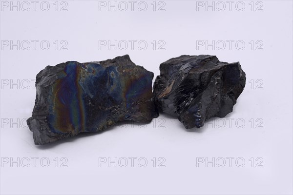 Pieces of anthracite from a New Zealand mine, known to the miners as rainbow coal or peacock coal.