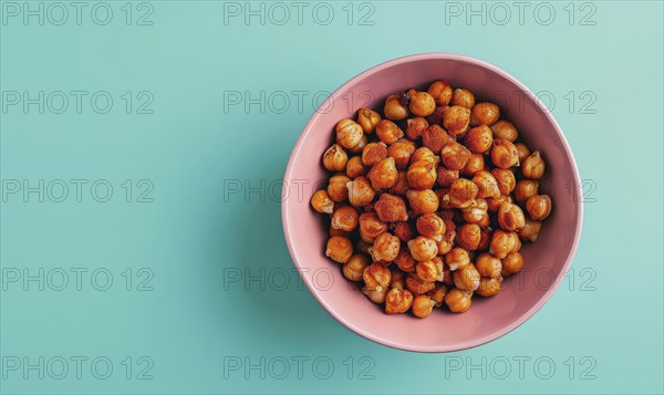 Roasted chickpeas with paprika in a pastel pink bowl AI generated