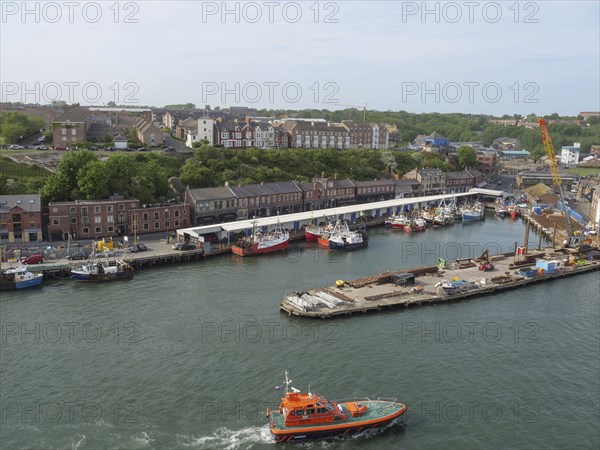Harbour view with numerous boats and buildings along the coast, Newcastle, England, Great Britain