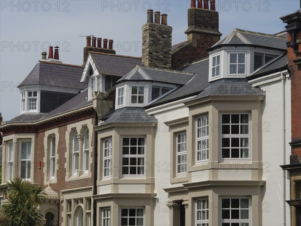Terraced houses with large windows and tiled roofs in an urban environment, tynemouth, England,