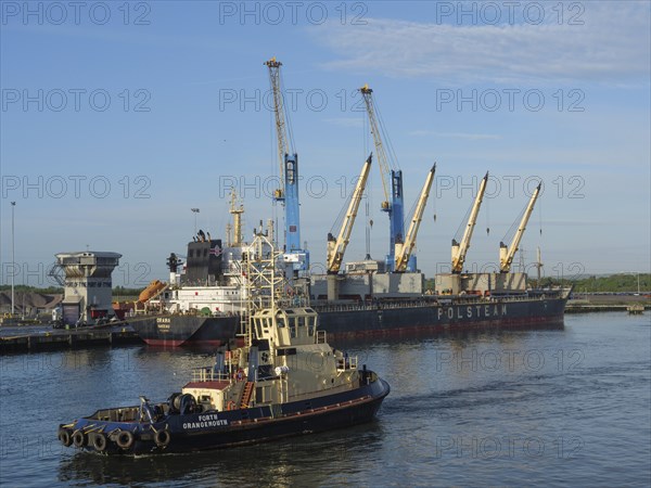 Harbour with big ships and cranes, peaceful atmosphere, blue sky, Newcastle, England, Great Britain