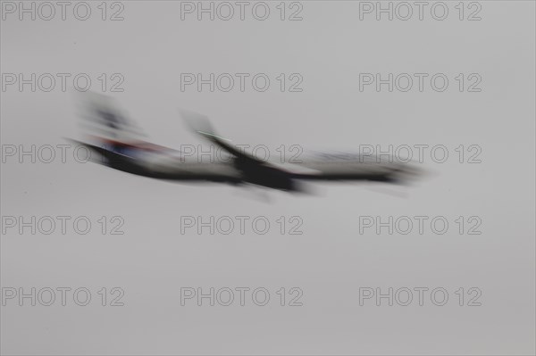 An aircraft lands, photographed at Berlin Brandenburg Airport 'Willy Brandt'Äô (BER) in Schönefeld,