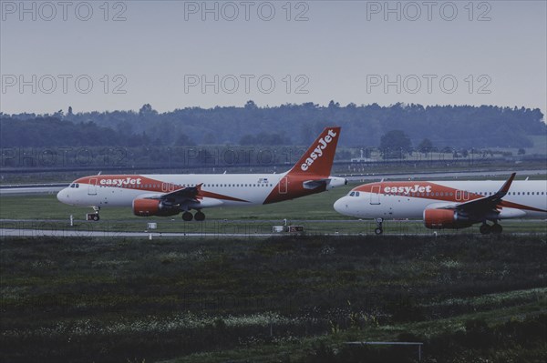 Two aircraft of the low-cost airline easyjet, photographed at Berlin Brandenburg Airport 'Willy