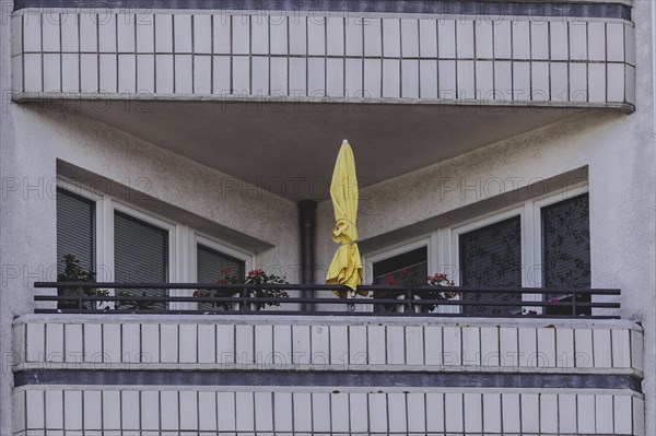 A parasol on a balcony of a block of flats, taken in Berlin, 07/08/2024