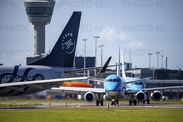 Aircraft at Amsterdam Schiphol Airport, on the taxiway for take-off on the Aalsmeerbaan, 18L/36R,