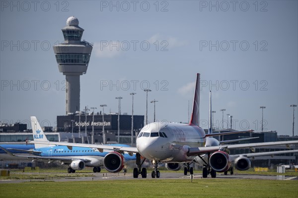 Aircraft at Amsterdam Schiphol Airport, on the taxiway for take-off on the Aalsmeerbaan, 18L/36R,