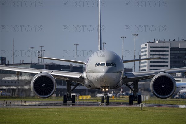 Aircraft at Amsterdam Schiphol Airport, on the taxiway for take-off on the Aalsmeerbaan, 18L/36R,