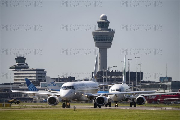 Aircraft at Amsterdam Schiphol Airport, on the taxiway for take-off on the Aalsmeerbaan, 18L/36R,