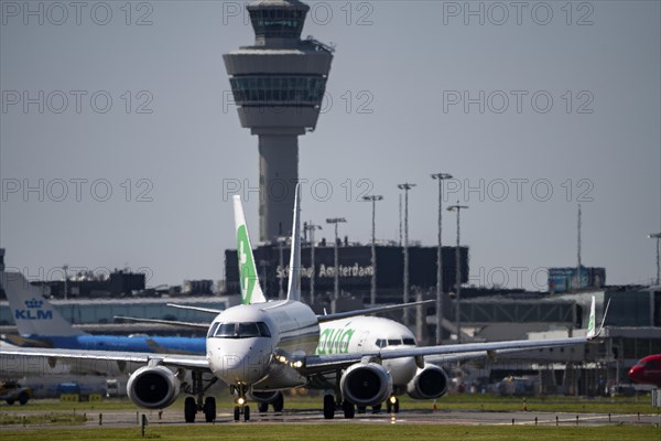 Aircraft at Amsterdam Schiphol Airport, on the taxiway for take-off on the Aalsmeerbaan, 18L/36R,