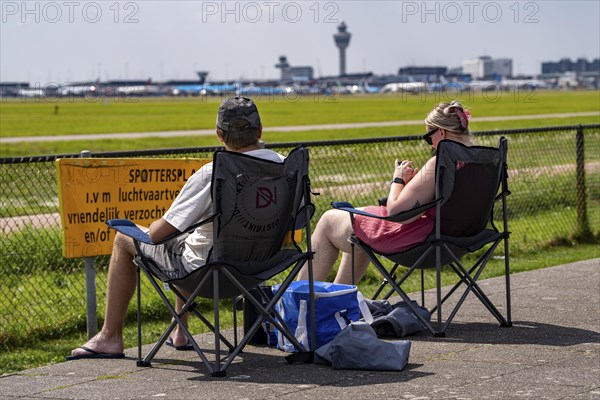 Amsterdam Schiphol Airport, planespotters, aircraft enthusiasts, at the Buitenveldertbaan, watch