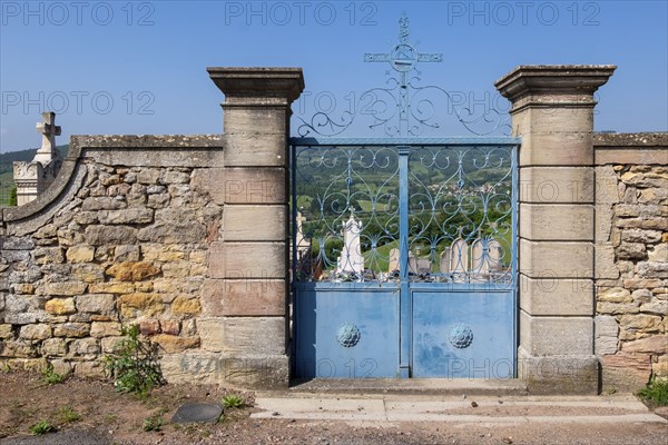 Cemetery wall with a blue entrance gate, Burgundy, France, Europe