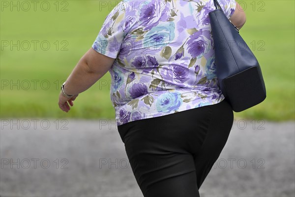 Symbol photo woman with overweight