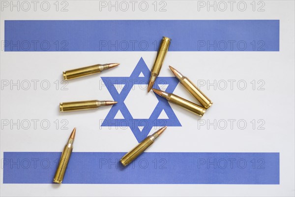 Israeli flag with cartridges, Middle East conflict