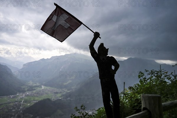 Sculpture flag-waver Harder Kulm viewpoint, Interlaken, Switzerland, Europe