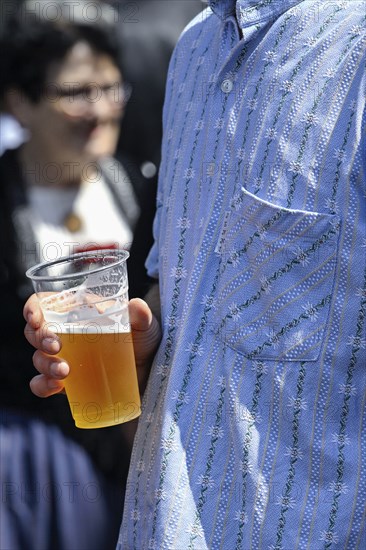 Man with beer cup