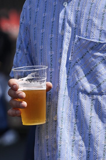 Man with beer cup