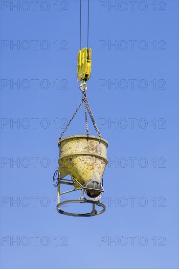 Concrete bucket of a construction crane, concrete silo, crane bucket