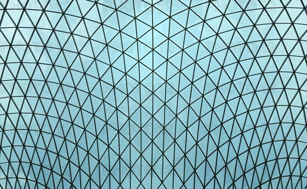 Interior view of the glass lattice roof over the great court in The British Museum, London,
