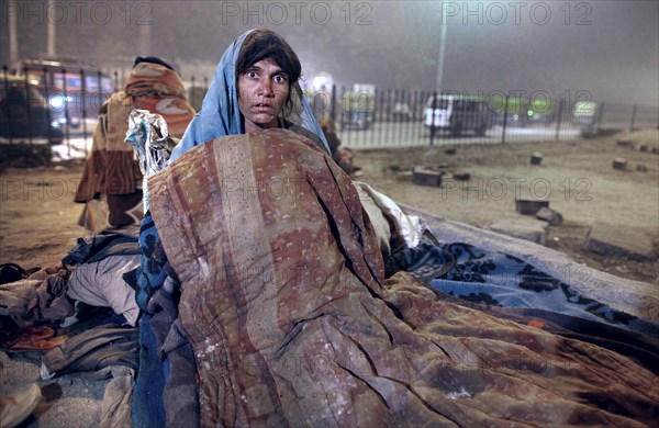New Delhi, India, 21.01.2010, Homeless woman. Sleeping place under a bridge, India, Asia