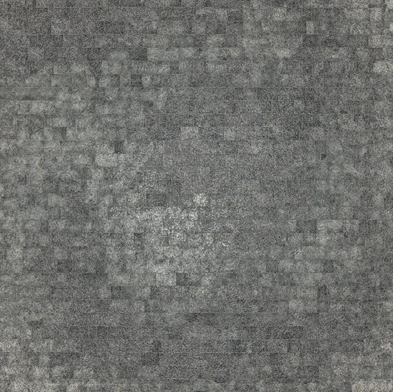 An abstract gray mosaic pattern consisting of numerous small square tiles creating a textured