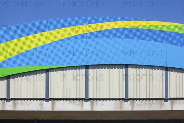 Colourfully painted motorway bridge with noise barrier over the river Este, Buxtehude, Altes Land,
