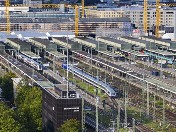 Track apron at the main station, platform with regional train and InterCity IC. After completion of