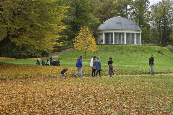 View of historic carousel with dome in autumn, walker, picnic, family outing, fallen leaves, leaf