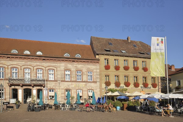 Market square with flag and street pub, Hammelburg, Lower Franconia, Franconia, Bavaria, Germany,
