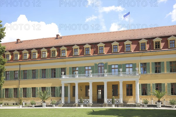 Classicist castle with arcade and shutters, yellow, green, Sondershausen, Thuringia, Germany,