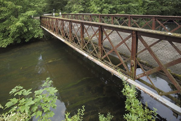 Bridge with railing over the Brigach, rusty, metal railing, castle park, Donaueschingen, Southern