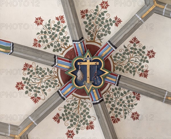 Cross of Jesus with the instruments of the scourge, keystone in the vault of the Cathedral of the