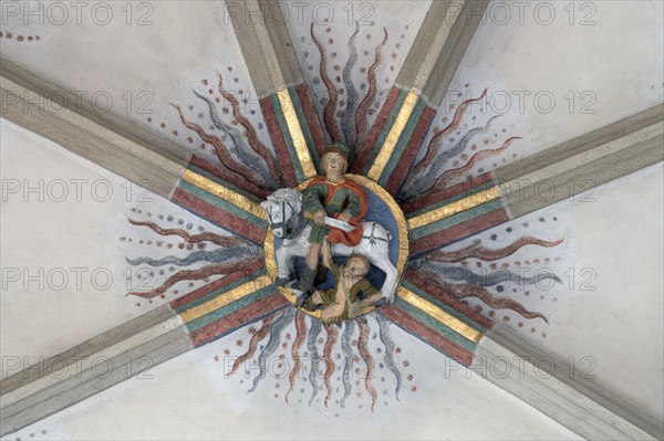 St Martin donating his cloak in Amien, depicted as a bull, keystone in the vault of St Martin's