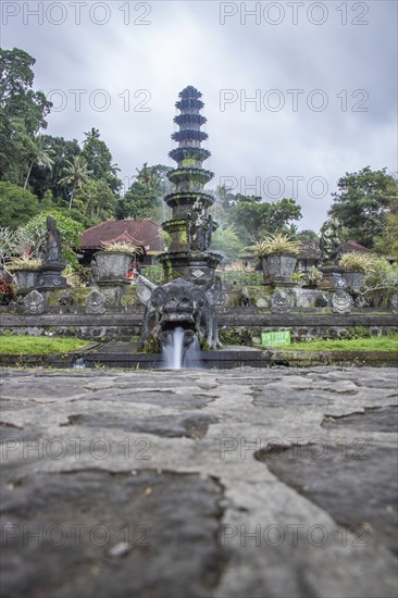 The water temple or water palace of the king. Tropical landscapes, colourful flowers and statues