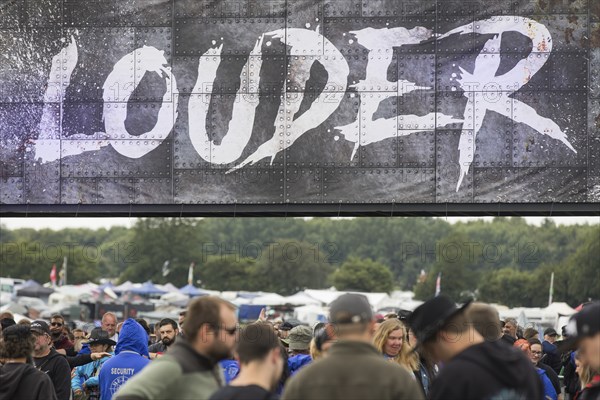 Admission control under the Louder lettering consisting of Louder Then Hell at the Wacken Open Air
