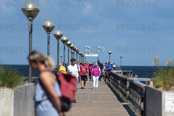 Holidaymakers on the pier in Graal-Müritz, Mecklenburg-Western Pomerania, Germany, Europe