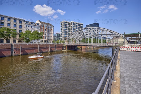 Kornhausbrücke over the Zollkanal with motorised sports boat, Speicherstadt, Free and Hanseatic