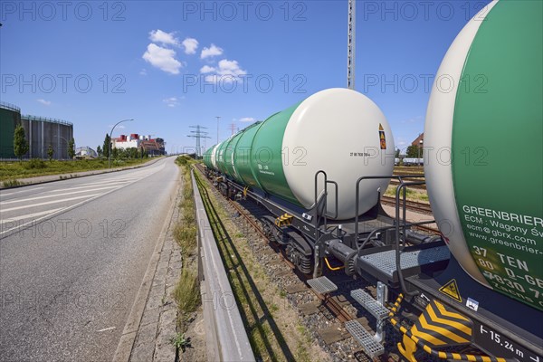 Road with railway tracks and tank wagons in Hamburg harbour, Free and Hanseatic City of Hamburg,