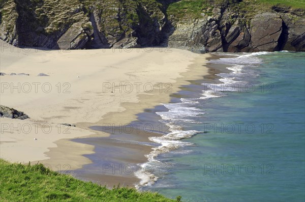 Calm sandy beach with shallow water and small waves, Blasket Islands, Dunmore Head, Ireland, Europe