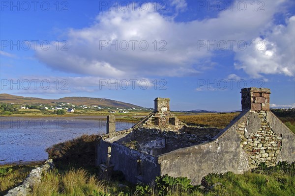 Stone ruins overlooking a bay and the sea, Achill Island, County Mayo, Ireland, Europe